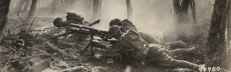 Gun crew from Regimental Headquarters Company, 23rd Infantry, firing 37mm gun during an advance against German entrenched positions., 1918