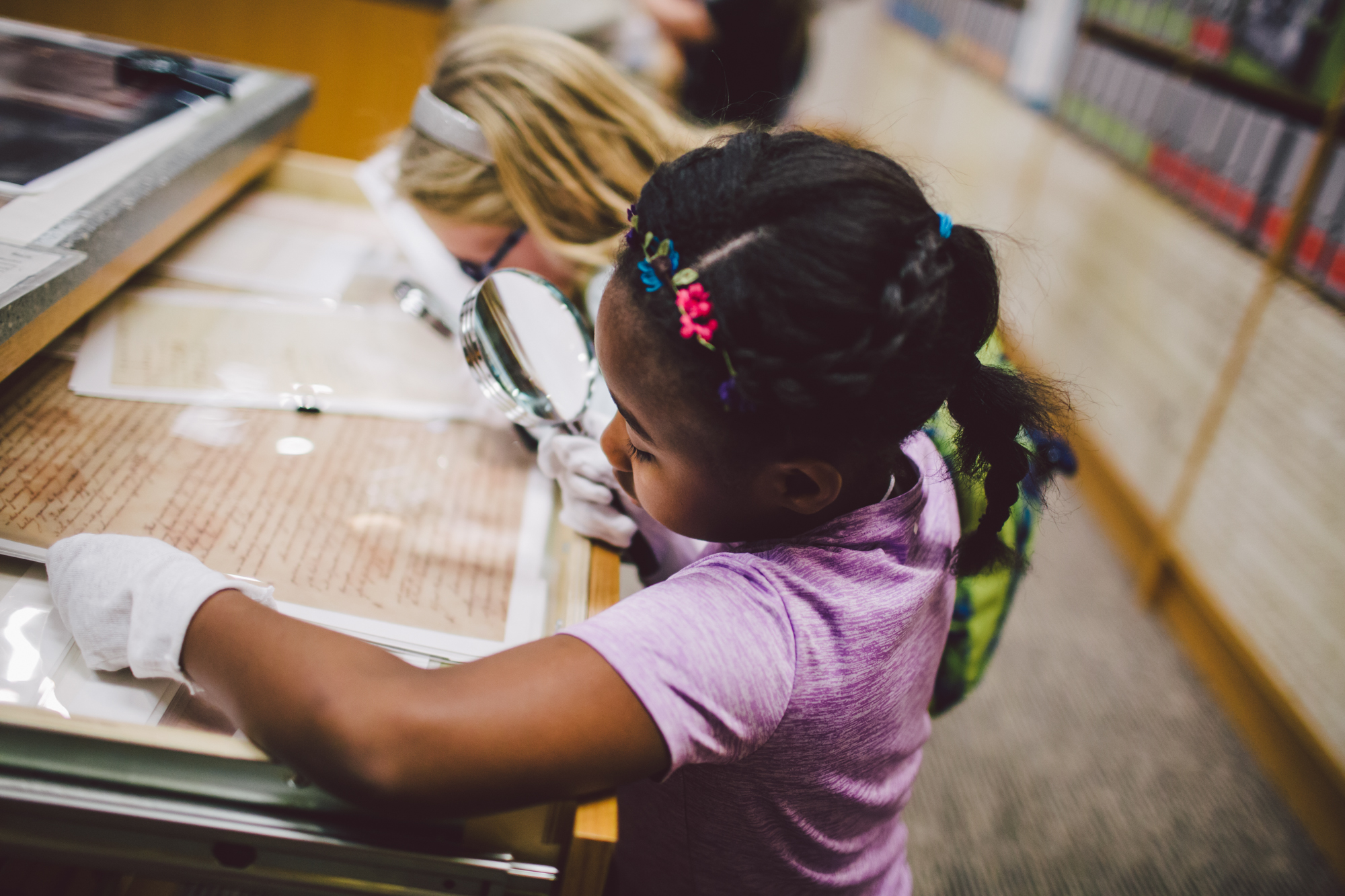 Children explore replica documents in the ReSource Room